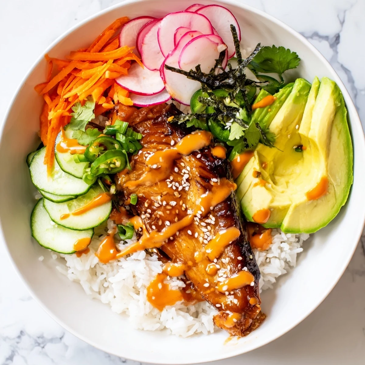 Tender teriyaki-glazed salmon rests on fluffy jasmine rice beside crunchy pickled carrots and cucumber in this fusion bowl.