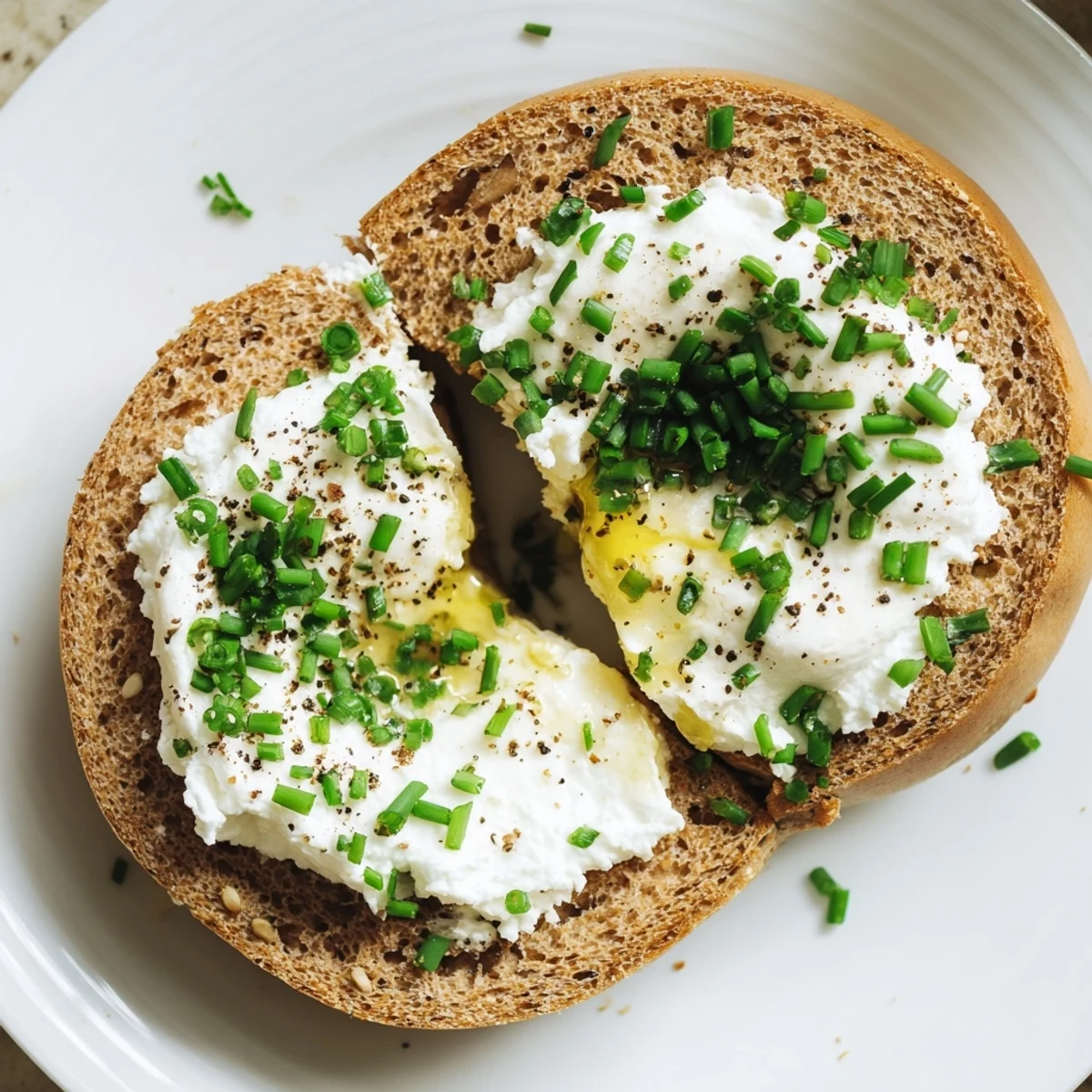 Freshly baked Protein Bagels with Cottage Cheese are served on a wooden board, ready for a nutritious American breakfast.