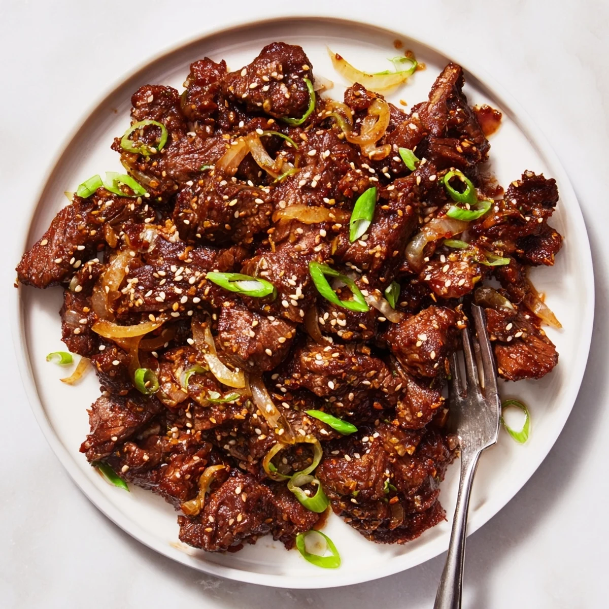 Crockpot Korean beef bowl featuring rich glaze and steamed rice for dinner