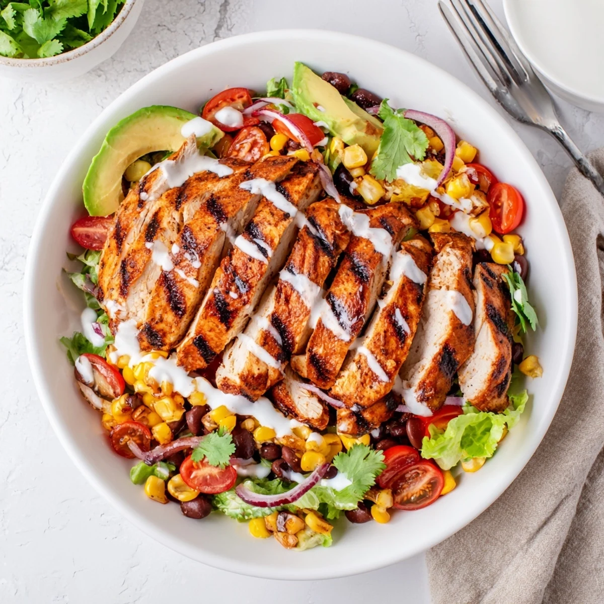 Bright Southwestern Chicken Salad with zesty lime dressing, juicy sliced grilled chicken.